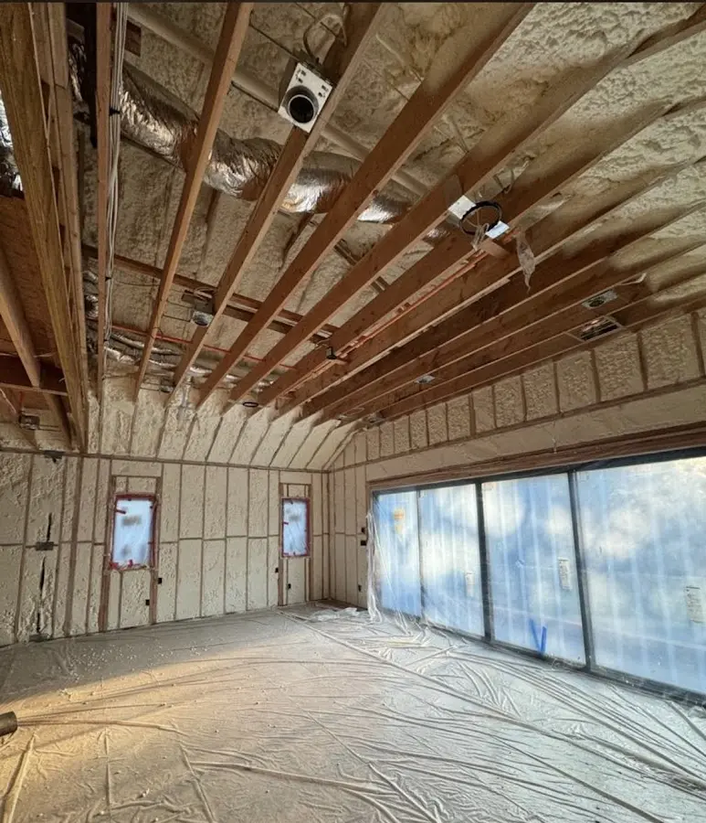 Interior walls and ceiling insulated with spray foam during new construction in Wichita Falls